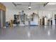 Well-organized garage featuring epoxy flooring, storage cabinets, and ample space at 17213 Bullhorn Cir, Punta Gorda, FL 33982