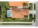 Aerial perspective of a single Gathering home highlighting the pool and beautifully landscaped backyard at 181 Padova Way # 19, Nokomis, FL 34275