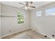 Bedroom featuring a window with blinds at 181 Padova Way # 19, Nokomis, FL 34275