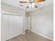 Bedroom featuring a ceiling fan and closet at 181 Padova Way # 19, Nokomis, FL 34275