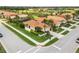 Charming single-story home with manicured lawn, mature palm trees, and a tile roof in a desirable neighborhood at 181 Padova Way # 19, Nokomis, FL 34275