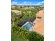 Enjoy beautiful views of the golf course from the screened in pool at 181 Padova Way # 19, Nokomis, FL 34275