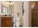 Powder room featuring updated vanity with granite counters and step in shower at 18602 Ashcroft Cir, Port Charlotte, FL 33948