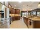 Modern kitchen featuring stainless steel appliances, granite countertops and tiled floors at 18602 Ashcroft Cir, Port Charlotte, FL 33948