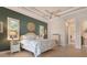 Stylish main bedroom features a tray ceiling and beautiful accents and decor at 18602 Ashcroft Cir, Port Charlotte, FL 33948