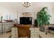 This home office features a large desk, custom cabinetry, neutral decor, and lots of natural light at 18602 Ashcroft Cir, Port Charlotte, FL 33948