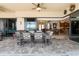 Inviting covered patio features a dining area and access to the home's interior, perfect for entertaining and relaxation at 18602 Ashcroft Cir, Port Charlotte, FL 33948