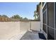 Private patio surrounded by tropical foliage, providing a serene outdoor space at 19505 Quesada Ave # M104, Port Charlotte, FL 33948