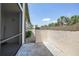 Enclosed outdoor patio with landscaping views, providing a relaxing retreat at 19505 Quesada Ave # M104, Port Charlotte, FL 33948
