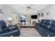 Spacious living room featuring views of the kitchen area at 2008 Pellam Blvd, Port Charlotte, FL 33948