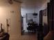Dining area with a small table set for four and an air conditioner at 2328 Picnic St, Port Charlotte, FL 33952