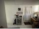 A living room with decorations, plants and furniture at 2328 Picnic St, Port Charlotte, FL 33952