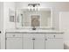 Modern bathroom featuring vanity with granite counters, ample storage, and stylish fixtures at 2381 Sheila Ln, North Port, FL 34286