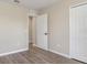 Bedroom with closet, neutral paint, and hardwood flooring at 2381 Sheila Ln, North Port, FL 34286