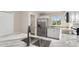 Open kitchen with stainless steel appliances, granite countertops, sink and ample storage space at 2381 Sheila Ln, North Port, FL 34286
