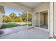 Screened in patio with view of backyard at 2381 Sheila Ln, North Port, FL 34286