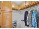 Walk-in closet features wood shelving and lots of storage space for organization at 27038 San Jorge Dr, Punta Gorda, FL 33983
