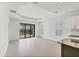 Spacious living room with large sliding glass doors and recessed lighting at 281 Potenza Loop, Nokomis, FL 34275