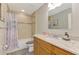 Bathroom featuring bath and shower combo, toilet, and sink with granite countertops at 3021 Toluca Ter, North Port, FL 34286