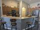 Well-equipped kitchen with breakfast bar, modern appliances, and ample counter space at 3021 Toluca Ter, North Port, FL 34286