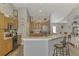Beautiful kitchen features granite countertops and bar seating that enhance entertaining at 3021 Toluca Ter, North Port, FL 34286