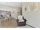 Relaxing living room features modern decor and stylish wood floors at 3021 Toluca Ter, North Port, FL 34286
