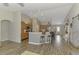 Open floor plan with bar seating seamlessly connects kitchen to the living area at 3021 Toluca Ter, North Port, FL 34286