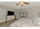 Comfortable primary bedroom with a view of the outdoor pool at 3021 Toluca Ter, North Port, FL 34286