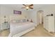 Spacious primary bedroom with stylish décor, comfortable Queen bed and modern furniture at 3021 Toluca Ter, North Port, FL 34286