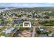 Aerial view of home nestled in a waterfront community with access to canals, ocean and lush greenery at 3301 Santa Barbara Dr, Punta Gorda, FL 33983