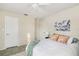 Bedroom featuring light walls, decorative pillows, and tiled floors at 3301 Santa Barbara Dr, Punta Gorda, FL 33983