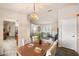 Open dining area showcasing seamless access to the living room, kitchen, and entryway at 3301 Santa Barbara Dr, Punta Gorda, FL 33983