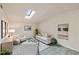 Cozy living room with skylight, neutral color scheme, and comfortable seating at 3301 Santa Barbara Dr, Punta Gorda, FL 33983
