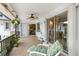 Relaxing patio featuring a ceiling fan, outdoor seating, and indoor views at 3301 Santa Barbara Dr, Punta Gorda, FL 33983