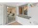 Outdoor patio with sliding glass doors and a service window at 3301 Santa Barbara Dr, Punta Gorda, FL 33983