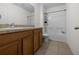 Functional bathroom with a vanity, a sink with chrome hardware, a bathtub, and a toilet, clean and well-maintained at 3941 River Bank Way, Punta Gorda, FL 33980