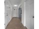 Inviting entryway with tile flooring and natural light leads into the home's living spaces at 3941 River Bank Way, Punta Gorda, FL 33980