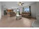 Spacious living room with lots of seating and natural light is perfect for relaxation and entertaining at 3941 River Bank Way, Punta Gorda, FL 33980