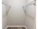 Walk-in closet with wire shelving offers ample storage space at 4158 Tamiami Trl # A5, Port Charlotte, FL 33952