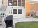 Enjoy outdoor living on this patio, complete with grill and convenient access to the main house at 4158 Tamiami Trl # A5, Port Charlotte, FL 33952