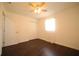Light filled bedroom with modern flooring, and a double closet at 514 Showalter Ave, Punta Gorda, FL 33950