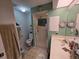 Cozy bathroom with a shower and storage at 5800 Sabal Trace Dr # 1201, North Port, FL 34287
