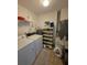 Functional laundry room equipped with a washer, dryer, and ample storage space at 5800 Sabal Trace Dr # 1201, North Port, FL 34287
