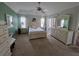 Spacious main bedroom with neutral carpet, large window, and plenty of closet space at 5800 Sabal Trace Dr # 1201, North Port, FL 34287