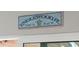 Decorative 'Englewood, FL' wall art adds a personalized touch to the home at 6286 Coniston St, Port Charlotte, FL 33981
