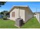 Back of a single-story home with lawn at 6841 46Th N St, Pinellas Park, FL 33781