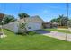 A single-story home with a well-maintained lawn and a two-car garage at 6841 46Th N St, Pinellas Park, FL 33781