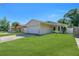 Charming single-story home with a well-maintained lawn and a two-car garage at 6841 46Th N St, Pinellas Park, FL 33781