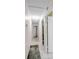 Hallway with multiple doors and tile flooring at 6841 46Th N St, Pinellas Park, FL 33781