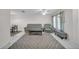 Spacious living room with tile floors and plenty of seating at 6841 46Th N St, Pinellas Park, FL 33781